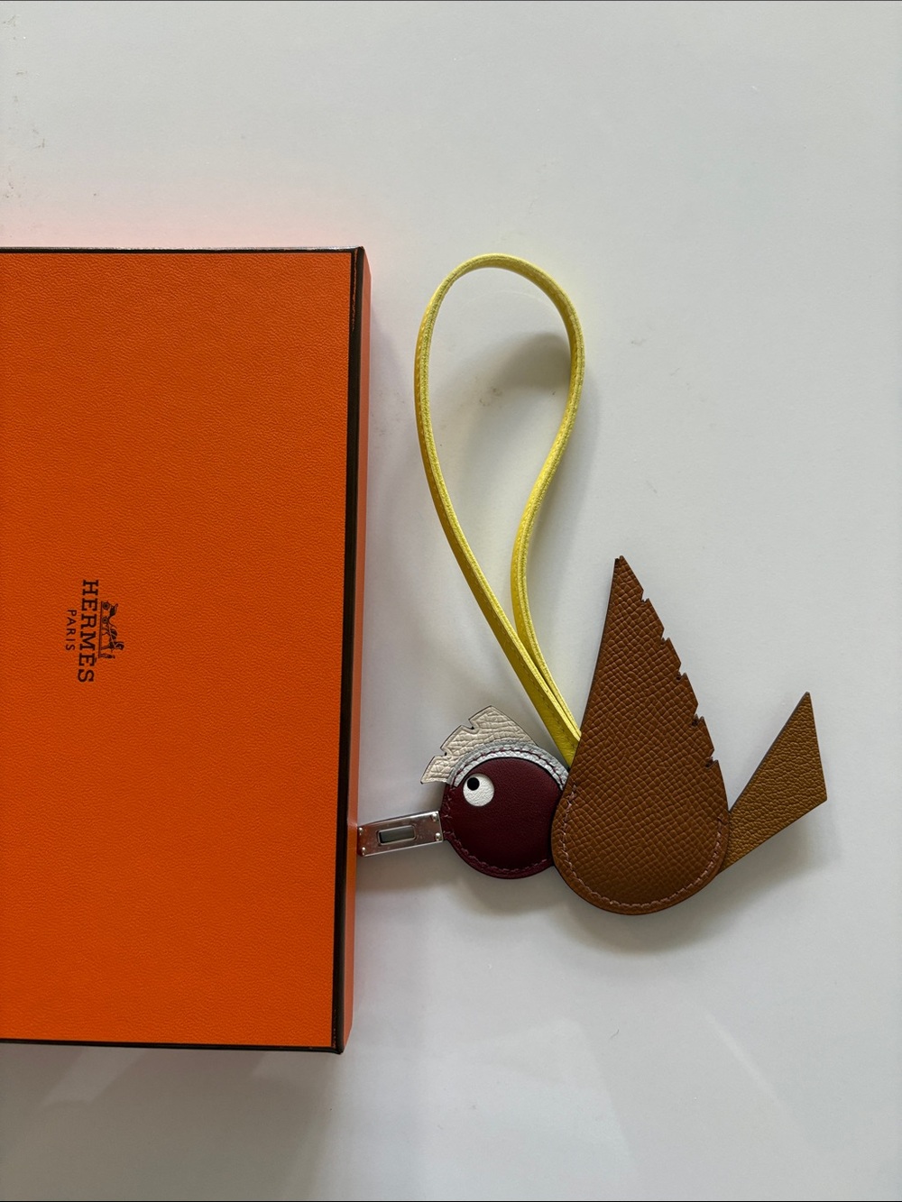 Hermes Bird Leather Bag Charm in gold caramel rouge H Brown, Burgundy & Yellow